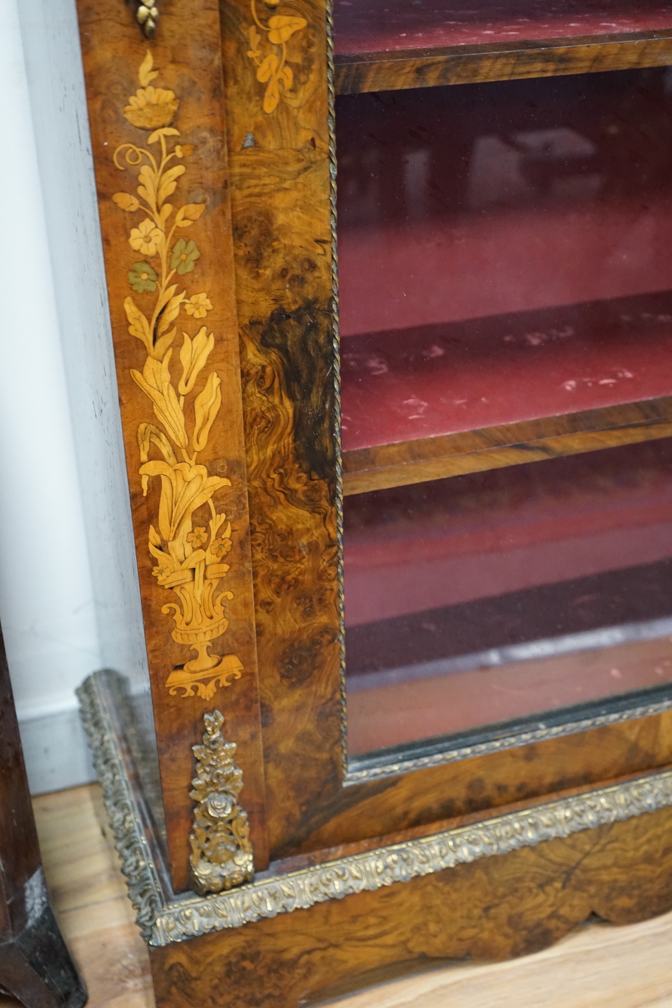 A Victorian burr walnut and floral marquetry inlaid gilt metal mounted pier cabinet, width 82cm, depth 34cm, height 105cm